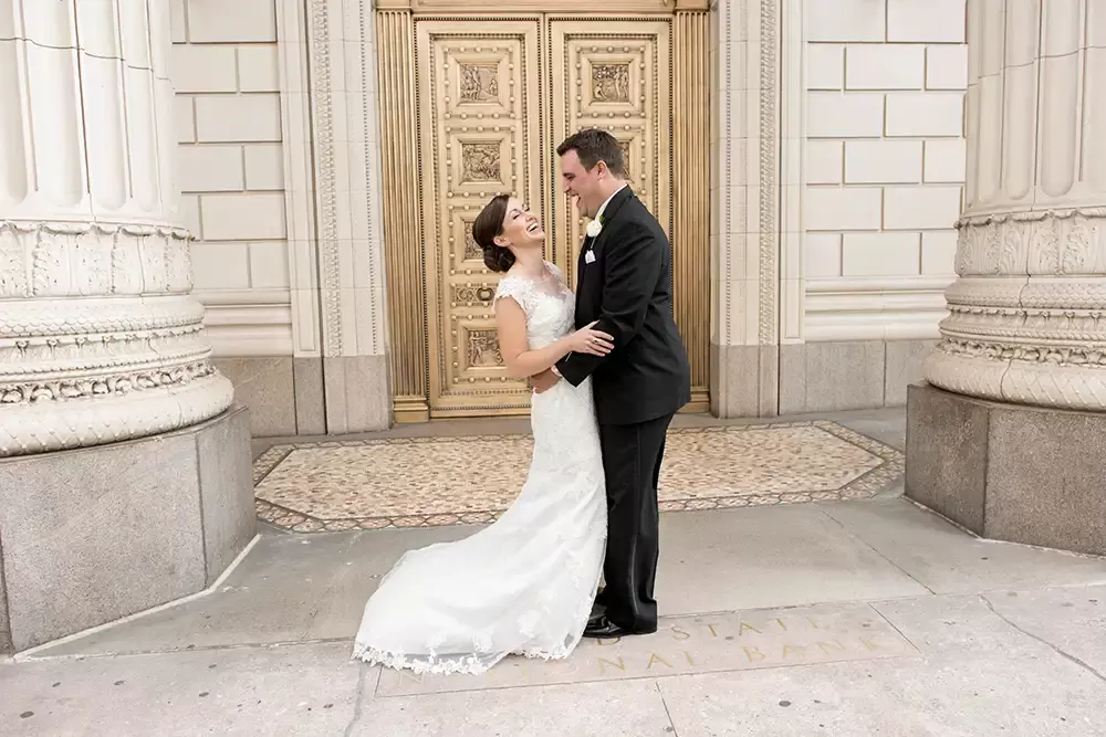Portland Wedding Photographer Robert Knapp catches this couple standing across the street from the Benson Hotel. 
