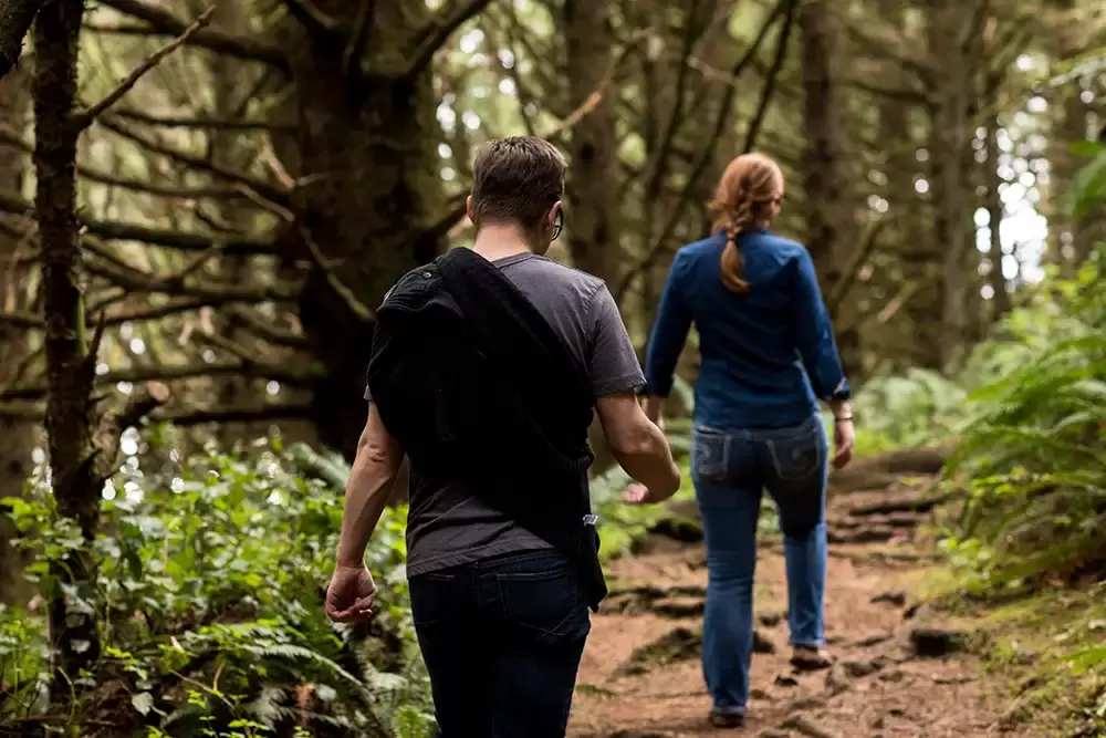 hiking out of the woods a couple walks on a path in the forest Modern Art Photograph 
Engagement Photography Portland Oregon