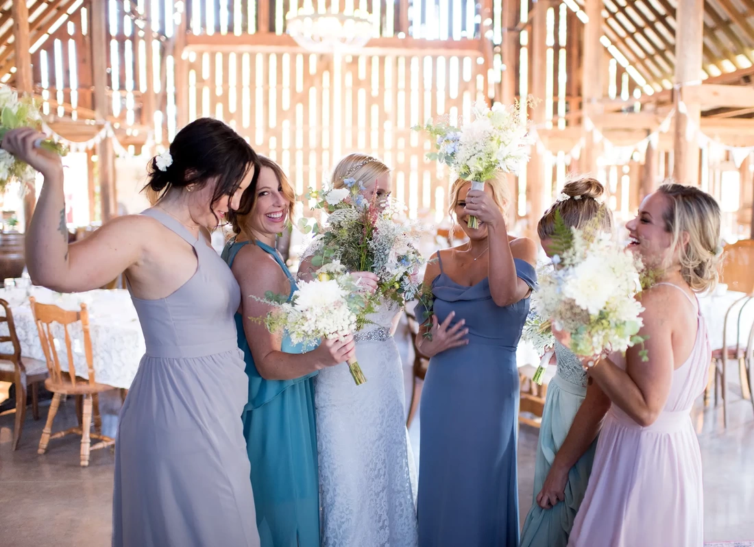 Tin Roof Weddings Barn Weddings Venues Near Me from Photographer Robert Knapp the bridesmaids and bride are all very happy, laughing and waving their flowers around. Tin Roof Weddings Barn Weddings Venues Near Me